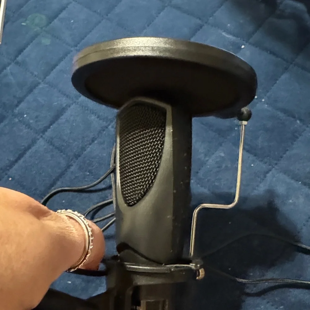 Black microphone with Tripod Stand****FINAL MARKDOWN****